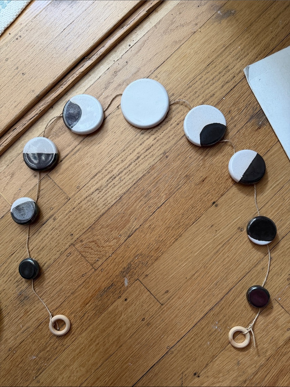 Urban Outfitters Ceramic Moon Phase Garland in White and Black